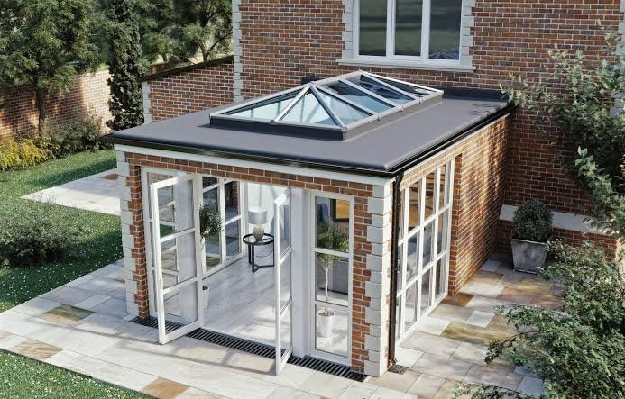 Conservatory roof replacement with insulated warm roof